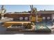 Resort-style pool area with modern water features, fire pits, and desert landscaping for luxurious outdoor living at 80 Glade Hollow Dr, Las Vegas, NV 89135
