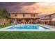 Inviting backyard showcasing a refreshing pool and a spacious covered patio for relaxation at 8115 Cowboy Springs St, North Las Vegas, NV 89085