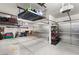 This bright garage features storage and space for multiple vehicles at 8115 Cowboy Springs St, North Las Vegas, NV 89085