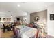 Spacious living and dining area with hardwood floors and neutral colors with views throughout the main floor at 8115 Cowboy Springs St, North Las Vegas, NV 89085