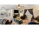 Upstairs loft area with comfortable seating, TV, and ample natural light at 8115 Cowboy Springs St, North Las Vegas, NV 89085