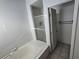 Bathroom with glass enclosed shower next to the soaking tub at 8401 Luna Bay Ln, Las Vegas, NV 89128