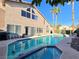 Beautiful pool and spa with palm tree views, perfect for relaxing and entertaining outdoors at 8401 Luna Bay Ln, Las Vegas, NV 89128
