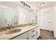 Bathroom featuring double sinks, granite counters and tile flooring at 8515 Belcastro St, Las Vegas, NV 89113