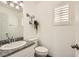 Well-lit bathroom with granite counters, modern fixtures, and a neutral color palette at 8515 Belcastro St, Las Vegas, NV 89113