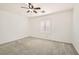 This bedroom boasts a ceiling fan and neutral walls at 8515 Belcastro St, Las Vegas, NV 89113