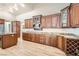 Gourmet kitchen with custom cabinetry, granite countertops, and stainless appliances at 8515 Belcastro St, Las Vegas, NV 89113