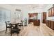 Spacious kitchen features wood cabinets, granite counters, and an eat-in dining area at 8515 Belcastro St, Las Vegas, NV 89113