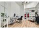 Bright home office with built-in bookshelves and ample natural light at 8515 Belcastro St, Las Vegas, NV 89113