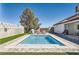 Private backyard pool with lounge chairs, perfect for relaxation and outdoor enjoyment at 8515 Belcastro St, Las Vegas, NV 89113
