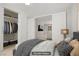 Cozy bedroom with closet and an open view to the adjacent living area at 8564 Scalpay St, Las Vegas, NV 89166