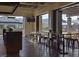 Chic restaurant dining area with modern seating and an open view of the outdoors and surrounding landscape at 8564 Scalpay St, Las Vegas, NV 89166
