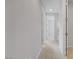 Hallway with doors leading to rooms and carpet flooring at 8564 Scalpay St, Las Vegas, NV 89166