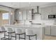 Stylish kitchen island with white quartz countertop and stainless steel appliances at 8564 Scalpay St, Las Vegas, NV 89166