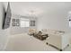 Bright living room with neutral colors, modern lighting, and comfortable seating for relaxation and entertainment at 8564 Scalpay St, Las Vegas, NV 89166