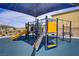 Community playground featuring a slide, climbing structure, and shade structure for sunny days at 8564 Scalpay St, Las Vegas, NV 89166