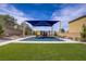 Community playground featuring artificial turf and a shade structure, creating a safe and fun recreational area at 8564 Scalpay St, Las Vegas, NV 89166