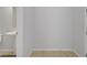 Clean powder room with pedestal sink, tiled floor, and neutral wall color at 8564 Scalpay St, Las Vegas, NV 89166
