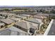 A high-angle view showcasing the orderly layout of homes in a suburban residential area at 8564 Scalpay St, Las Vegas, NV 89166