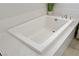Close-up of a soaking tub with clean lines and modern fixtures at 8564 Scalpay St, Las Vegas, NV 89166