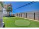 Spacious backyard featuring a putting green, perfect for outdoor activities and relaxation at 8725 Hawk Canyon St, Henderson, NV 89074