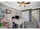 Charming bedroom featuring a stylish work desk and a bookshelf, blending work and relaxation at 8725 Hawk Canyon St, Henderson, NV 89074