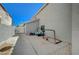 View of driveway featuring a golf cart, storage, and a soccer net at 8725 Hawk Canyon St, Henderson, NV 89074