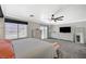Spacious main bedroom with large windows, neutral tones, and modern furnishings at 8725 Hawk Canyon St, Henderson, NV 89074