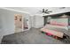 Large main bedroom boasts walk-in closet and ensuite bathroom with a separate tub at 8725 Hawk Canyon St, Henderson, NV 89074