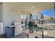 Entertain on the covered patio, featuring a barbecue, foosball table, and outdoor seating area at 8725 Hawk Canyon St, Henderson, NV 89074