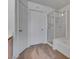Bathroom with glass shower, bath tub and white cabinets at 8771 Martinique Bay Ln, Las Vegas, NV 89147