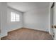 Bedroom featuring natural light and plush carpeting at 8771 Martinique Bay Ln, Las Vegas, NV 89147