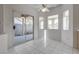Bright dining area with sliding glass doors that lead to the backyard at 8771 Martinique Bay Ln, Las Vegas, NV 89147