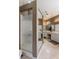 Bathroom featuring double sinks, lots of mirrors, and a shower stall at 8894 Don Horton Ave, Las Vegas, NV 89178