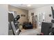 Bedroom complete with exercise equipment, home theater, and comfortable seating at 8894 Don Horton Ave, Las Vegas, NV 89178