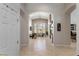 Spacious foyer with arched doorways and views of the dining room at 8894 Don Horton Ave, Las Vegas, NV 89178