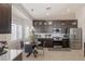 Charming kitchen with stainless steel appliances and cozy breakfast nook at 8894 Don Horton Ave, Las Vegas, NV 89178