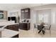 Well-lit kitchen featuring dark wood cabinets and a breakfast nook at 8894 Don Horton Ave, Las Vegas, NV 89178