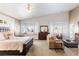 Spacious main bedroom featuring vaulted ceilings, bay window seating, and an adjacent sitting area at 8894 Don Horton Ave, Las Vegas, NV 89178