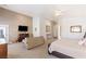 Spacious main bedroom suite boasts sitting area and neutral tones at 8894 Don Horton Ave, Las Vegas, NV 89178