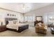 Spacious main bedroom suite features a sitting area and window seat at 8894 Don Horton Ave, Las Vegas, NV 89178