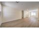 Expansive living space featuring wood-look floors and neutral paint at 9193 Black Slate St, Las Vegas, NV 89123