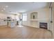 Open-concept living room and kitchen with modern finishes and plenty of natural light at 9193 Black Slate St, Las Vegas, NV 89123