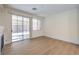 Bright, open living room with sliding glass door leading to backyard and patio at 9193 Black Slate St, Las Vegas, NV 89123