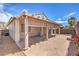 Backyard patio featuring a covered structure with a view of the well-maintained perimeter wall at 9193 Black Slate St, Las Vegas, NV 89123