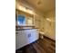 Bathroom featuring granite countertops, modern hardware, and white cabinets at , Henderson, NV 89014