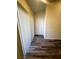 A bright entryway showcases attractive flooring and a secure white front door with tasteful window blinds at , Henderson, NV 89014