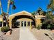 A well-maintained fitness center with palm trees, desert landscaping, and a clearly marked entrance at , Henderson, NV 89014