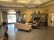 Elegant clubhouse lounge featuring a decorative fireplace, plenty of comfy seating, and natural light at , Henderson, NV 89014