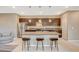 Kitchen with a large island, stainless steel appliances, and stylish pendant lighting at 1541 Unison Way # 102, Las Vegas, NV 89135